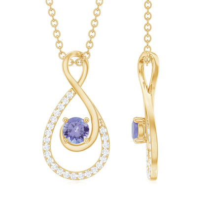 Souverel Dames Ketting met Druppelvormige Tanzaniet en Diamanten Hanger in 14K Geelgoud