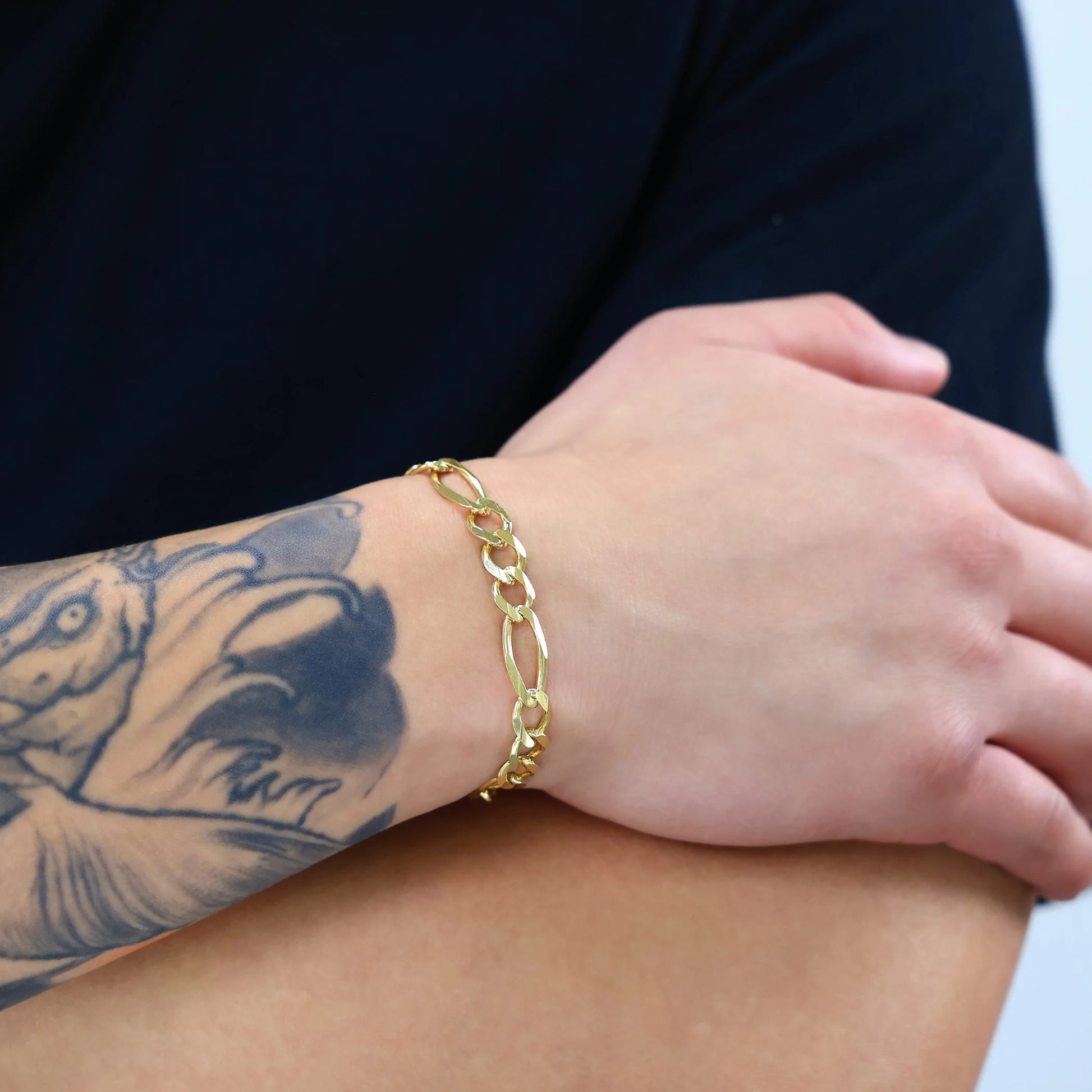 Souverel – Italiaanse Herenarmband van Massieve Figaro Schakel in Echt 14K Geelgoud